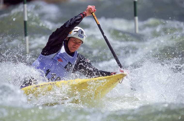 David Hearn maneuvers a canoe on the water