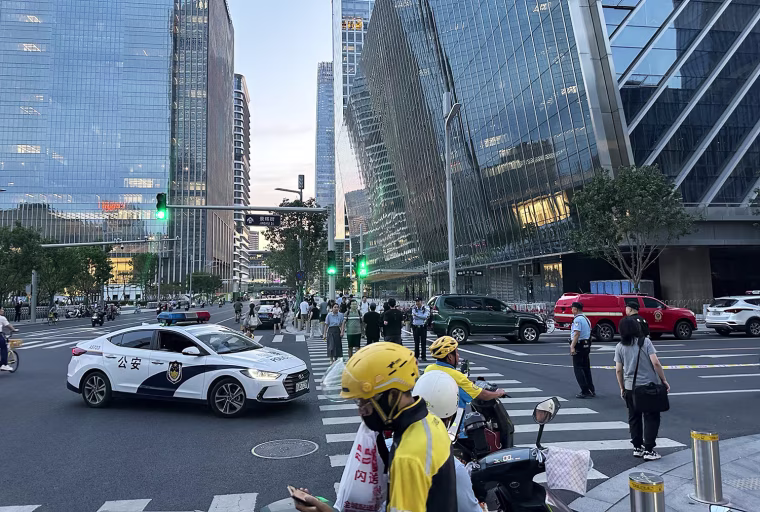 Small plane crashes into tower in Beijing