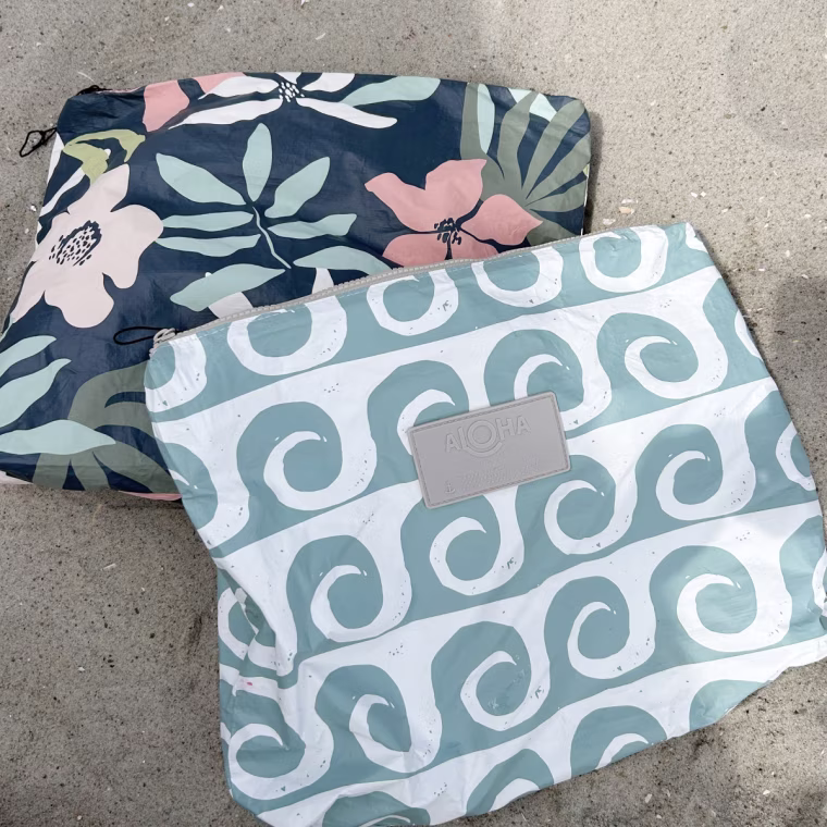 These Aloha pouches saved the day — wet, sandy clothes went straight in, everything else stayed clean.