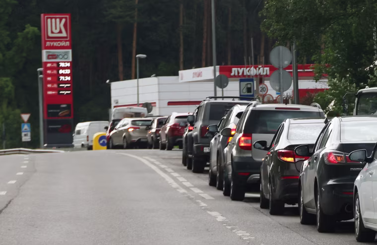 Cars in line at a Lukoil gas station on July 8, 2026 outside of Moscow, Russia.
