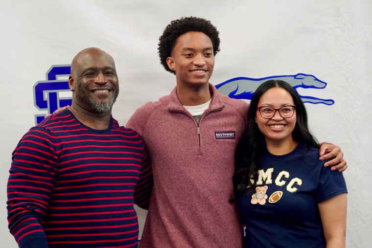 Nolan Wells with his parents.
