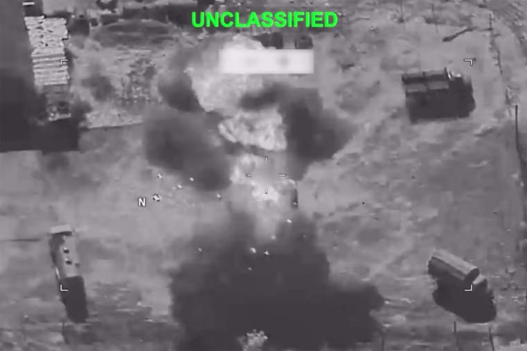 Smoke rises following an explosion at an unknown location during what U.S. Central Command said were strikes on Iran in a video still released Wednesday.