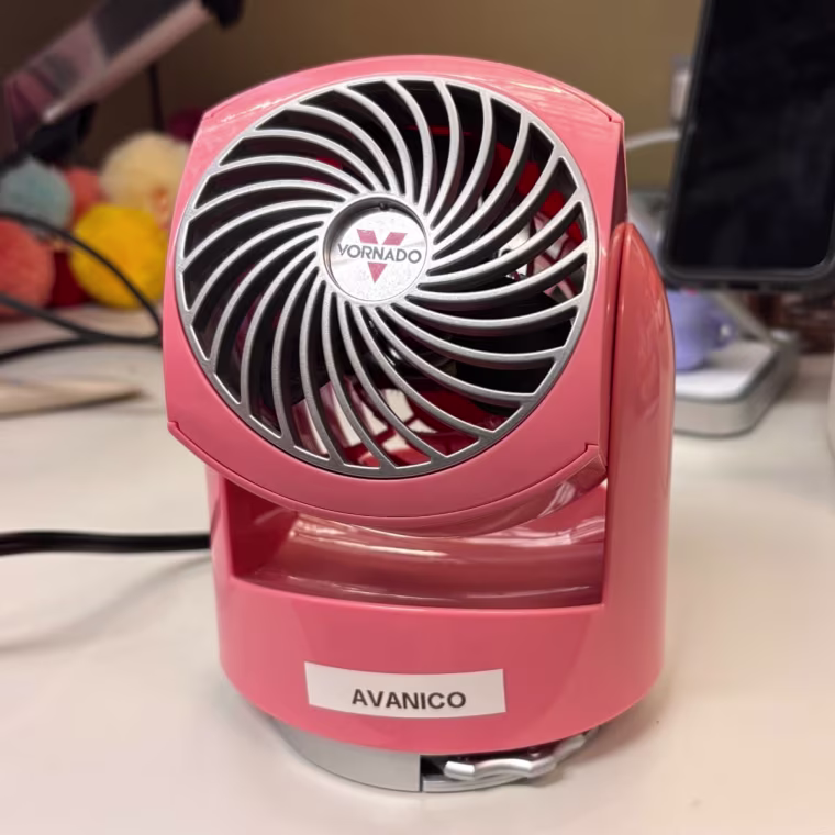 Vornado desk fan sitting on a desk