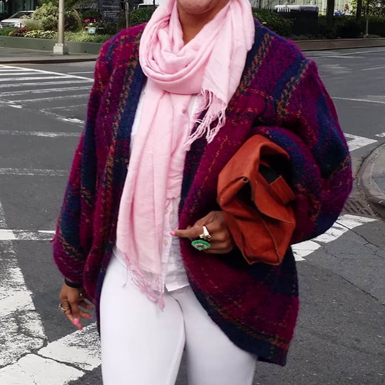 Sandra Okerulu showcases an example of an oversized cardigan style.