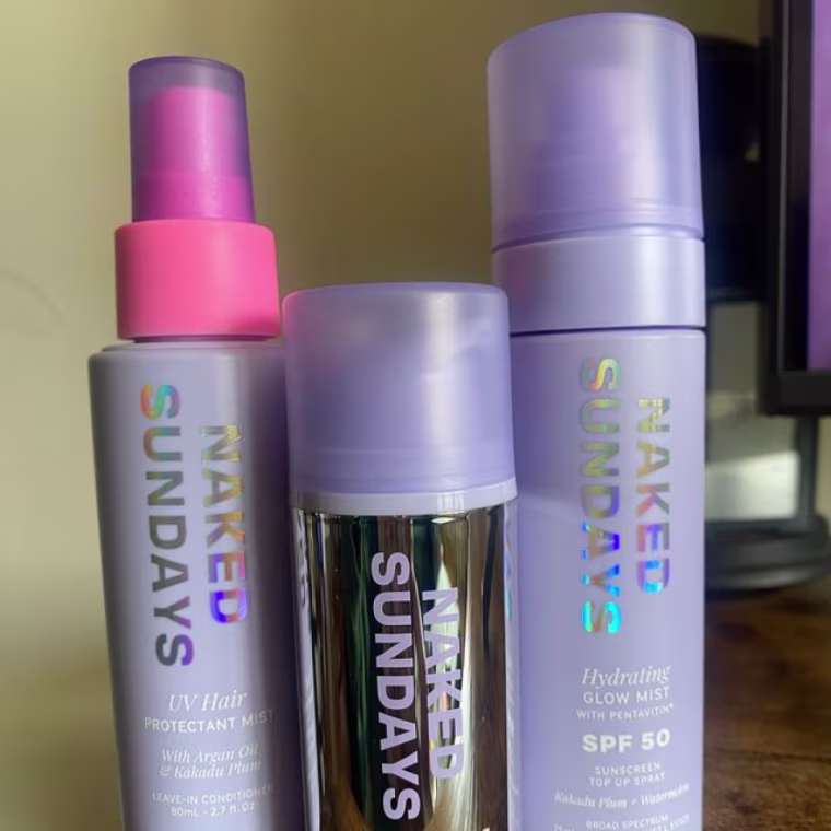 Three Naked Sundays SPF products on a counter