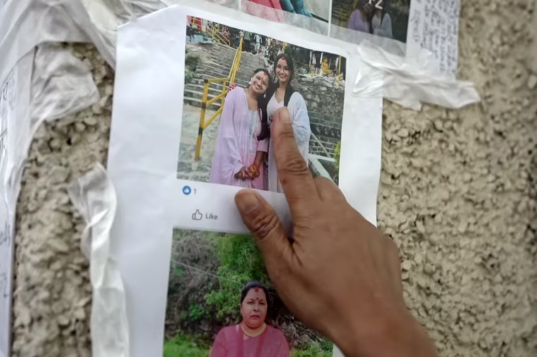 A poster featuring Shrestha’s missing family members.