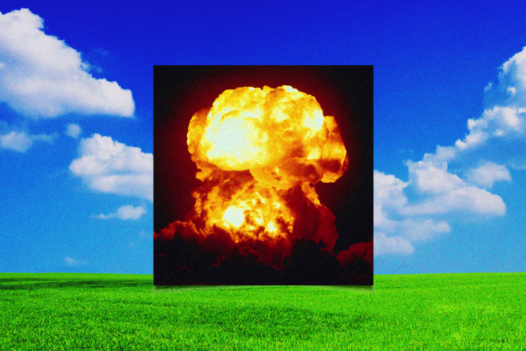 Photo illustration of green grass and bright blue sky with an inset of a mushroom cloud, in shades of orange and red.