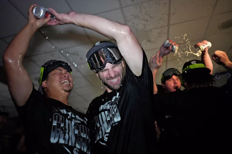 Chicago White Sox players Munetaka Murakami and Tristan Peters celebrate in the clubhouse