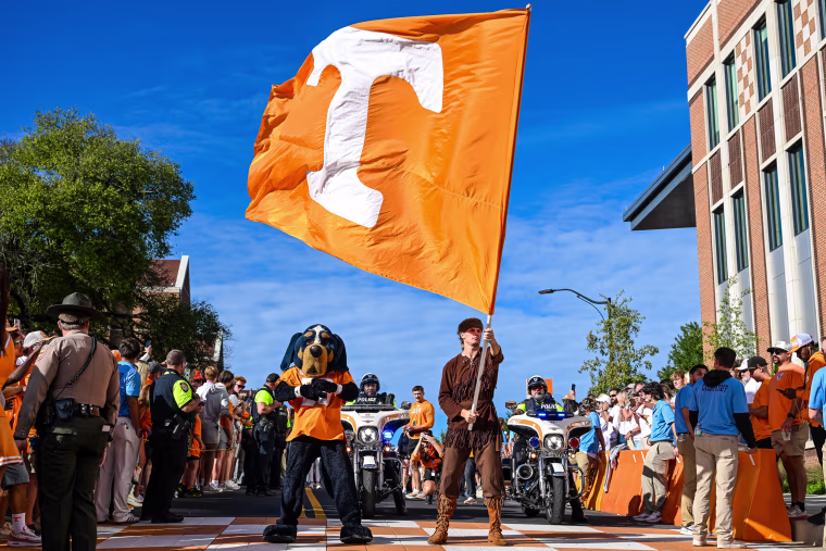 Tennessee Volunteers mascots Smokey and Davy Crockett entertain the crowd.