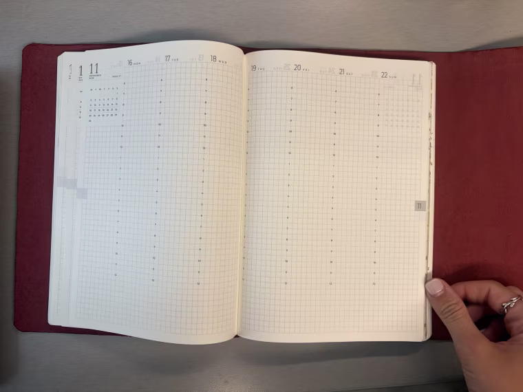 Sterling Ink Common Planner open on a table.