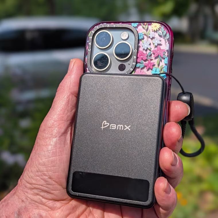 This wireless charger is equipped with several useful features, including a carrying strap!