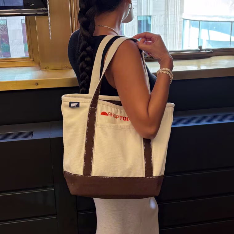 Jannely Espinal wears the Lands' End tote bag for work.