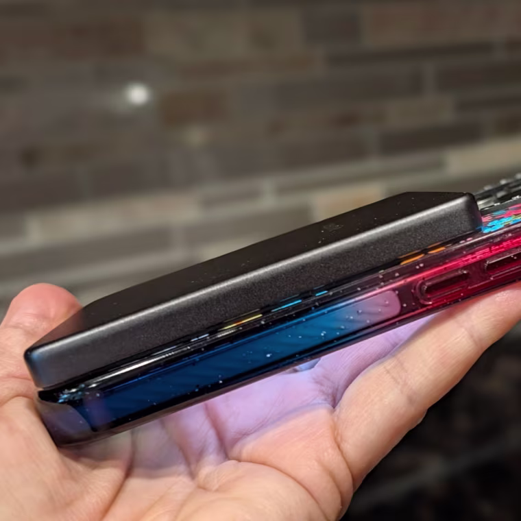 The Mophie portable charger is just a hair thinner than my iPhone. 
