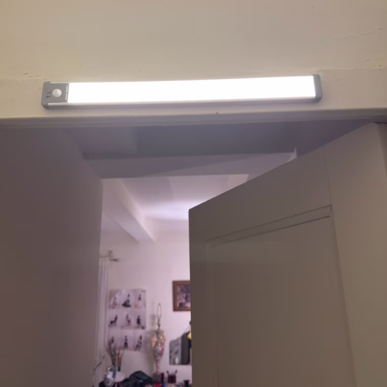 Photo of a light strip above a door.