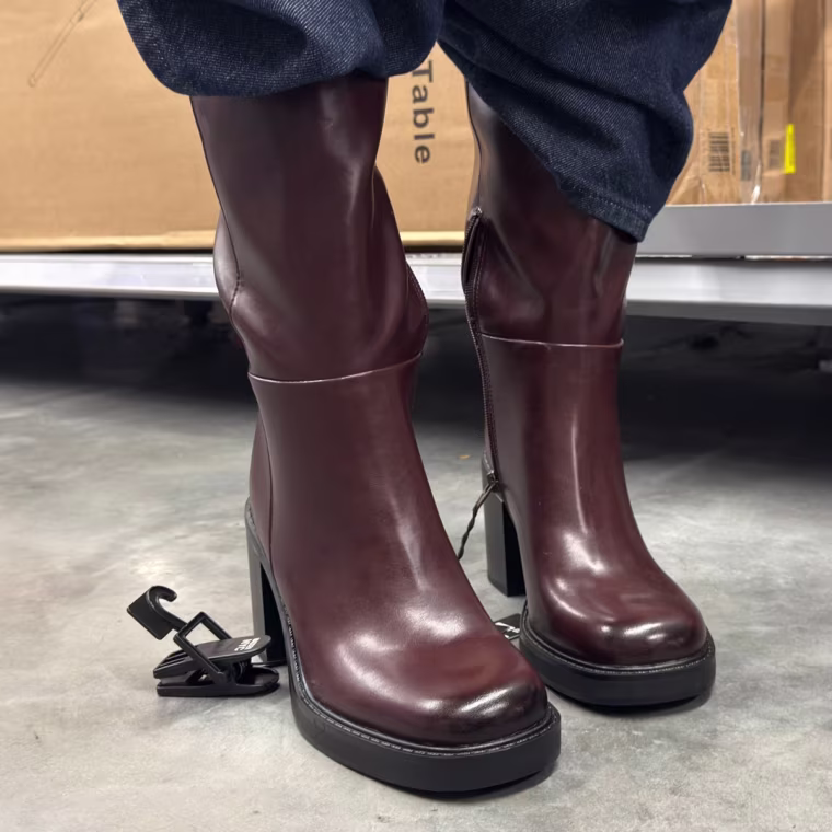  Photo of red/burgundy boots.