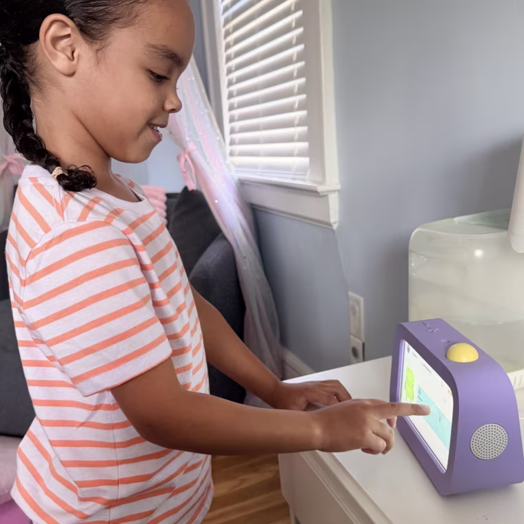 Child using a touchscreen smart device