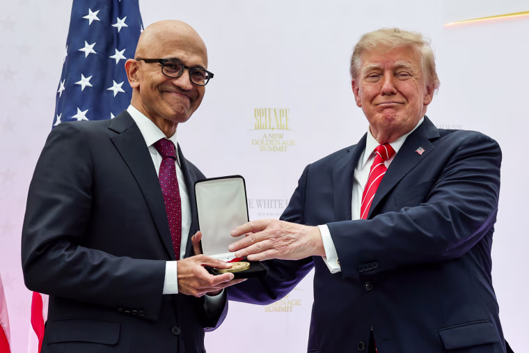 CEO of Microsoft Satya Nadella, left, receives the National Medal of Technology and Innovation from U.S. President Donald Trump.