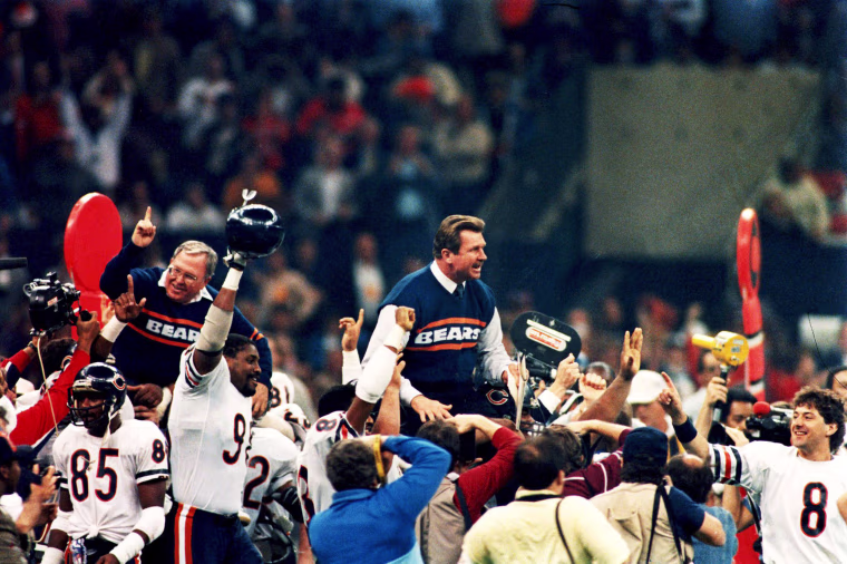 Chicago Bears head coach Mike Ditka and defensive coordinator Buddy Ryan are carried around the field after Super Bowl XX in 1986.