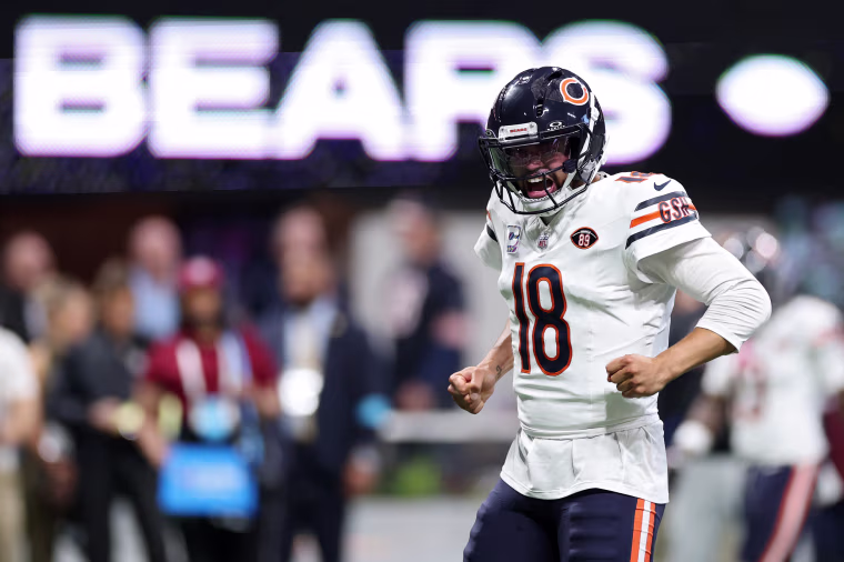 Chicago Bears quarterback Caleb Williams celebrates a touchdown against the Atlanta Falcons in the third quarter. 
