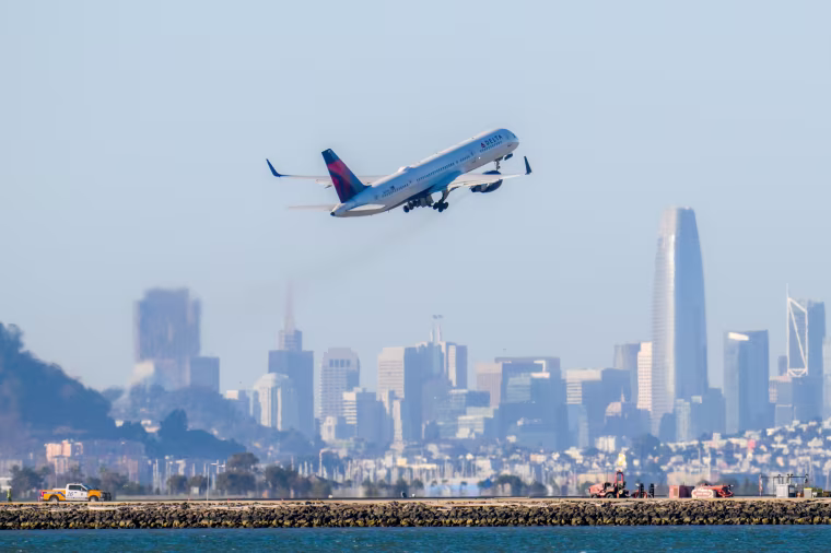 A Delta Airlines plane taking off.
