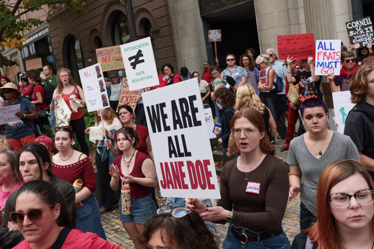 Protesters rally in support of a former Cornell University student known as Jane Doe