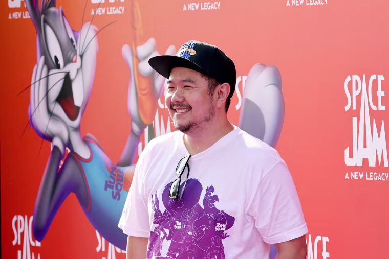 Image: Eric
Bauza at a film premiere, with an image of Bugs Bunny on a backdrop behind him.
