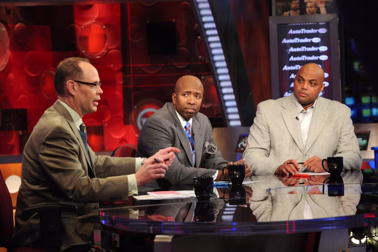 "Inside the NBA" host Ernie Johnson with analysts Kenny Smith, center, and Charles Barkley in 2010.