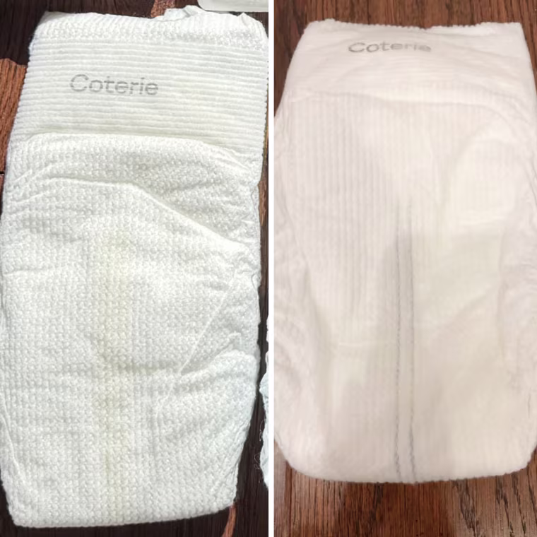 Side-by-side photos of a white, textured Coterie diaper, showing a faint yellow wetness line on the left and a blue line on the right.