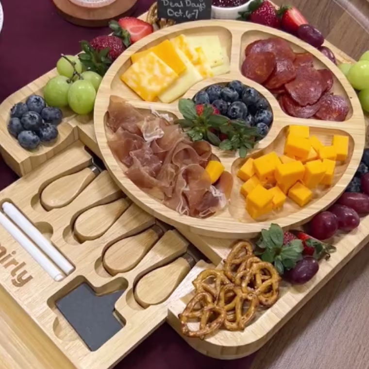 Charcuterie spread on wooden board