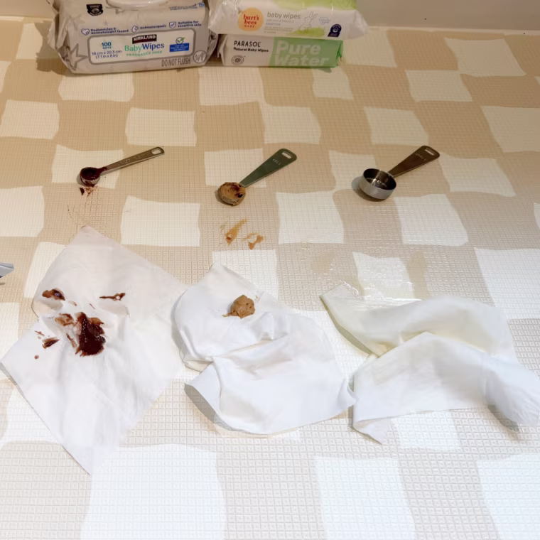 The Coterie wipes picked up a good amount of pudding and peanut butter, but struggled a bit with the juice.