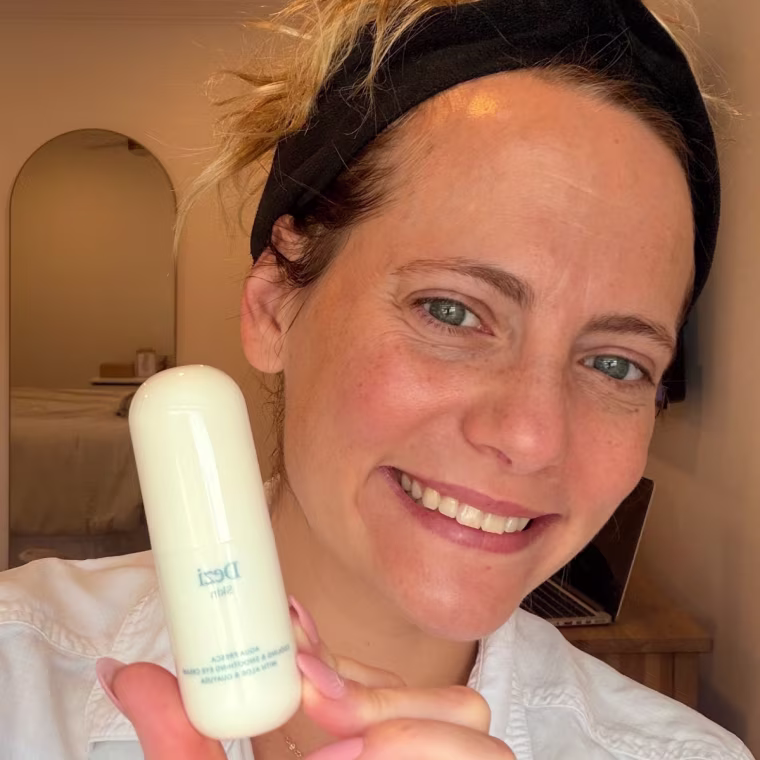 Nicole Kelleher using the Dezi Skin Agua Fresca Cooling Eye Cream.