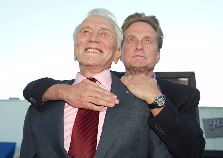 Kirk and Michael Douglas at the premiere "Works in the Family" at the Bruin Theater in Los Angeles on April 7, 2003.