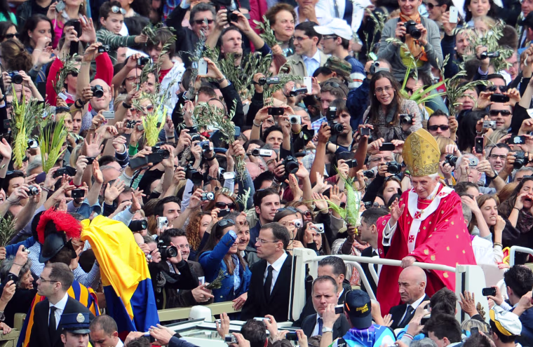 Pope Benedict XVI leaves after celebrating the Palm Sunday mass in St Peter's square at the Vatican, on April 1. Palm Sunday marks the start of the holy week of Easter in celebration of the crucifixion and resurrection of Jesus Christ.