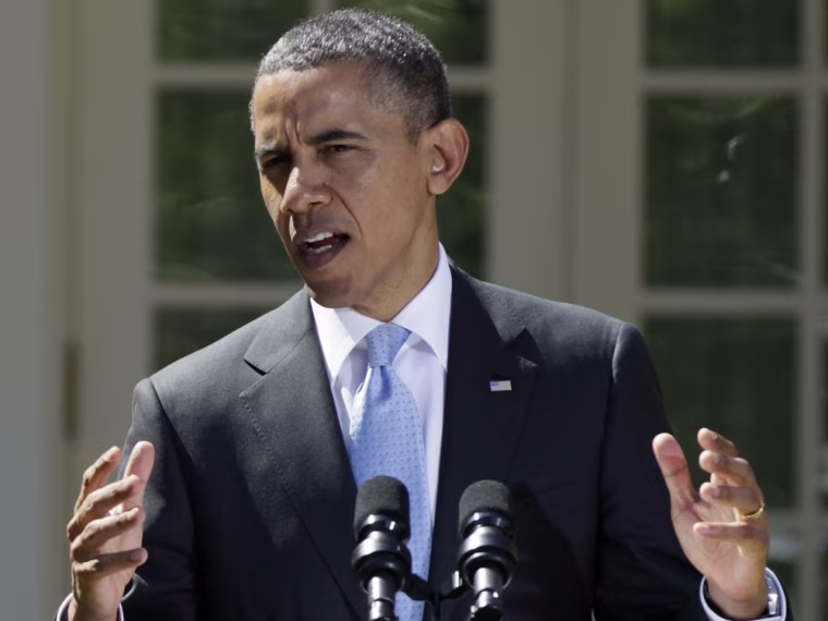 President Barack Obama gestures during a joint news conference on Monday, April 2, 2012, in the Rose Garden of the White House.