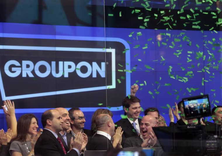 Groupon's shares debut on the Nasdaq Stock Market.