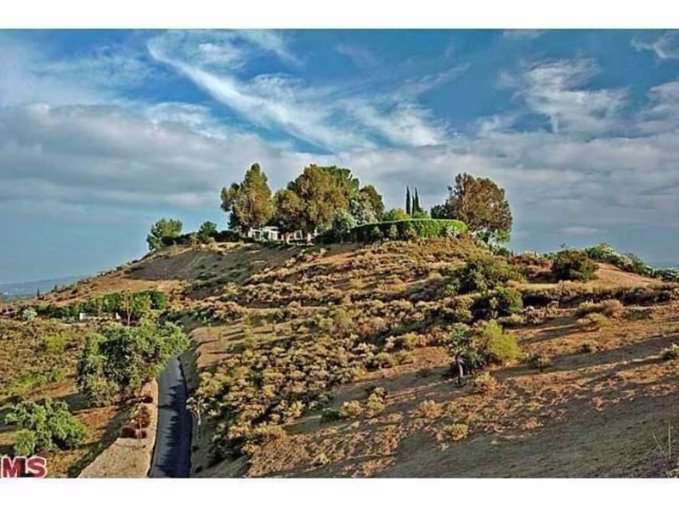 The property is incredibly private. It sits on top of a hill 40 minutes outside of Los Angeles.