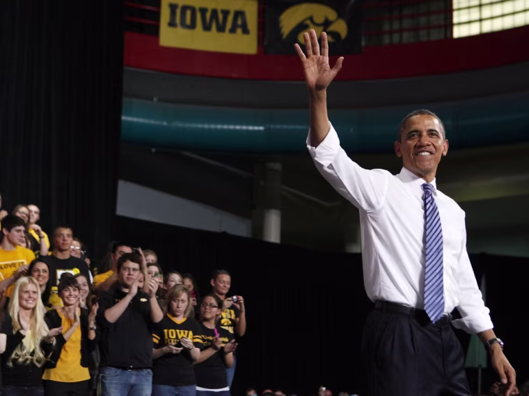 President Barack Obama waves after he talks about the rising costs of student loans while at the University of Iowa in Iowa City, April 25, 2012.