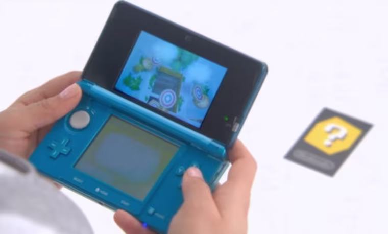 The 3DS comes packaged with six AR Cards and the Augmented Reality Games that make use of them. 3-D visuals combined with the augmented reality effects do a stunning job making it look as if your video games are crossing over into your real world.