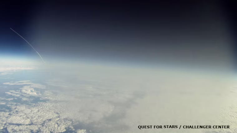 This is a frame grab from a video shot by a GoPro Hero Motorsport on a helium balloon launched to image the shuttle Discovery as it transited the stratosphere. The fogging is due to the fact that the balloon is coming through the troposphere when this picture was taken at 5:05 ET.