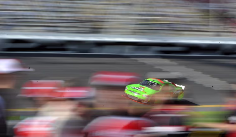 Danica Patrick drives her car during qualifying for Saturday's NASCAR Nationwide Drive4COPD 300 auto race in Daytona Beach, Fla., Friday, Feb. 24, 2012. (AP Photo/Rainier Ehrhardt)