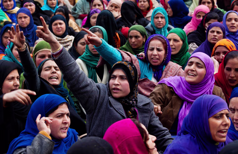 Kashmiri Muslim women workers of Accredited Social Health Activist (ASHA) shout slogans against the government during a one-day general strike in Srinagar, India, Tuesday, Feb. 28, 2012. Shops and banks were closed, factories shuttered and traffic sparse in major cities across India during an industrial strike Tuesday called by trade unions against the government. Eleven major trade unions called for the strike to protest against rampant inflation. (AP Photo/Dar Yasin)