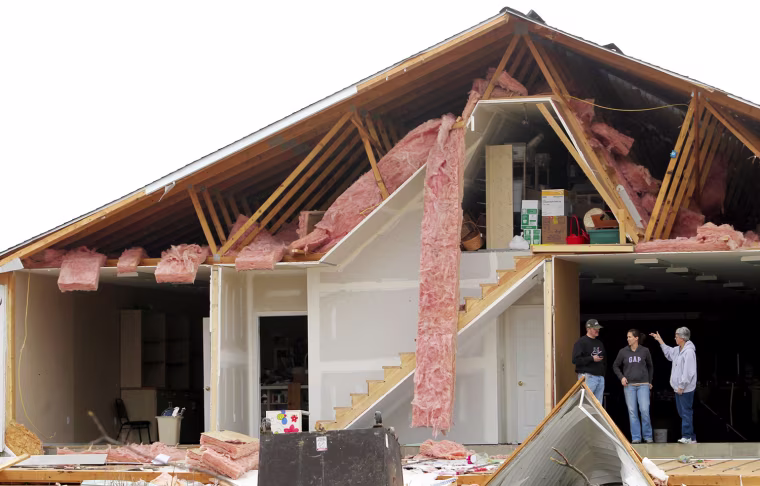 Feb. 29, 2012 - Harrisburg, IL, USA - One of the owner's of Dream Baskets, a gourmet food eatery located off Route 45, look out the exposed north side of the restaurant, which was destroyed by a tornado, Wednesday, February 29, 2012, in Harrisburg, Illinois. (Credit Image: © Laurie Skrivan/St. Louis Post-Dispatch/MCT/ZUMAPRESS.com)