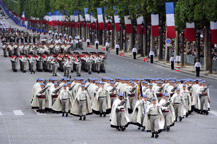 French soldiers from the 1st Spahis Regiment take part in the annual Bastille Day military parade on the Champs-Elysees in Paris on July 14.