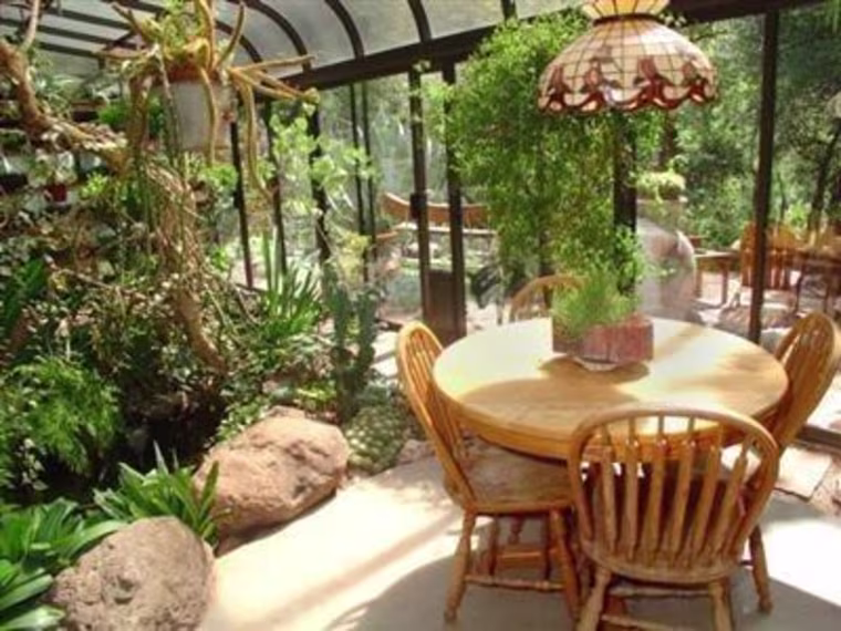 The home has a interior garden and koi pond, but both reportedly require very little maintenance.