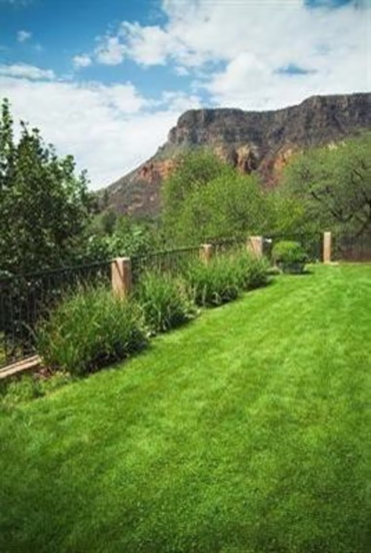 The sod roof has a hot tub, bed and views of the canyon.