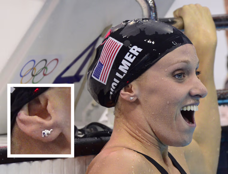U.S. swimmer Dana Vollmer wears her elephant stud earrings on July 29, 2012 in London.