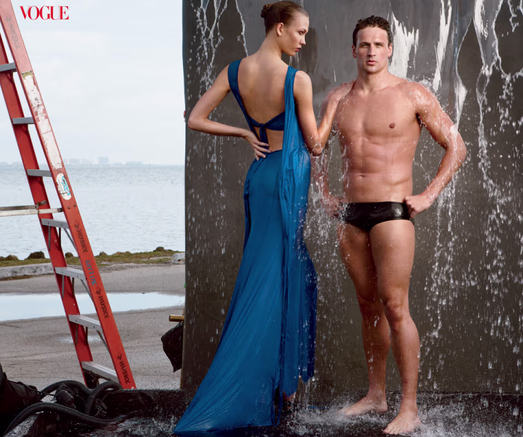 Swimmer Ryan Lochte splashes around with model Karlie Kloss.