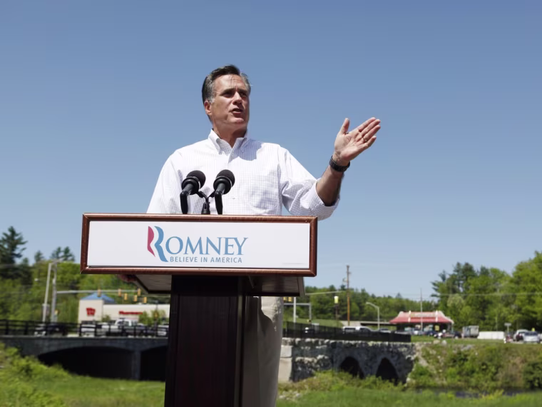 Republican presidential candidate and former Massachusetts Governor Mitt Romney speaks to supporters in front of Sawyer Bridge during a campaign event in Hillsborough, New Hampshire May 18, 2012.
