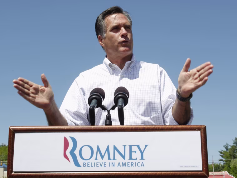 Mitt Romney speaks to supporters in front of Sawyer Bridge during a campaign event in Hillsborough, N.H., May 18, 2012.