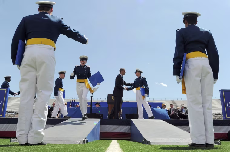 Graduates of U.S. Air Force class of 2012 celebrate as they are greeted by President Barack Obama during their graduation ceremony at the Air Force Academy in Colorado Springs, Colo. on May 23.